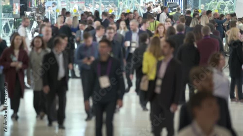 Wallpaper Mural Crowd of people walking indoors, the foreground is defocused, Torontodigital.ca