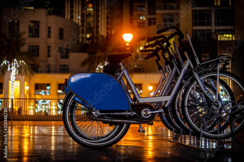 Cycles in night lights Burj Park