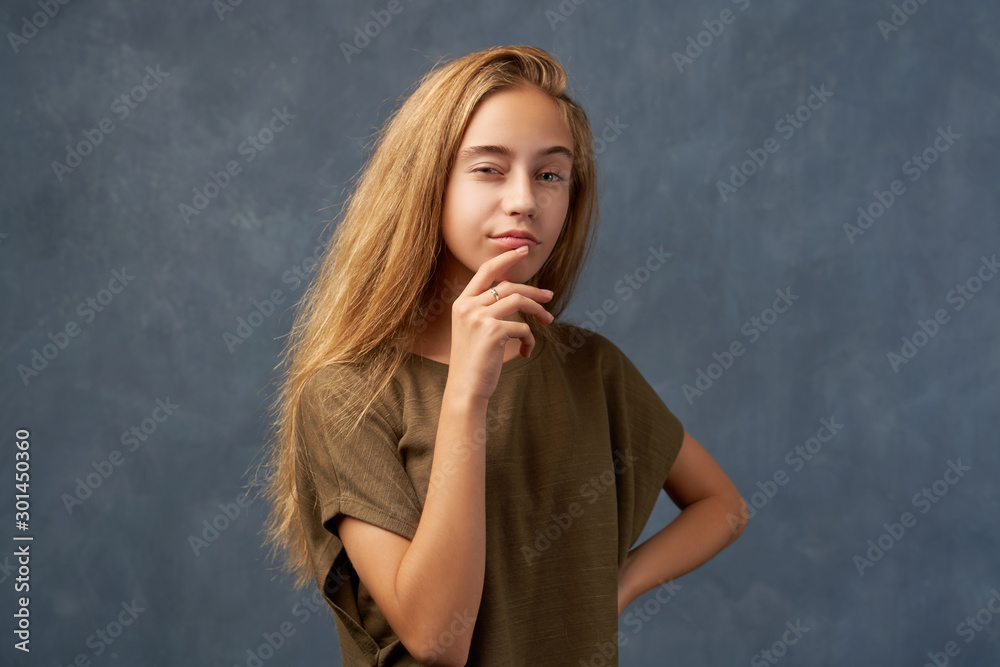 Teenage girl blonde isolated texture wall Studio Teenage girl blonde isolated texture wall Studio