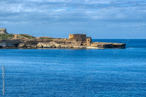 Obraz na płótnie The Il-Qolla I-Badja battery near Marsalforn, Gozo, Malta, Europe w salonie