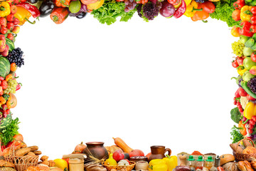 Fruits, vegetables, bread, milk and other food products in form frame isolated on white