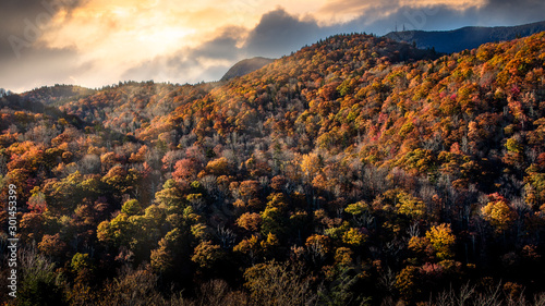 Dramatic sunset with sun rays in Blue Ridge Parkway during the Golden Hour photo