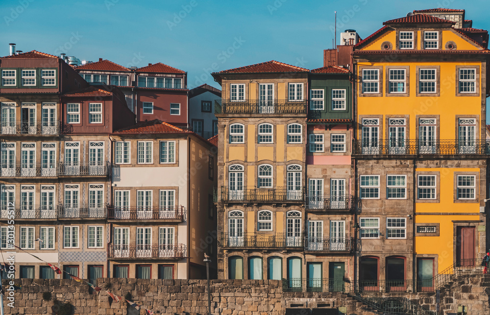 Colorful houses of Ribeira, in front of the Douro river in Porto, Protugal Colorful houses of Ribeira, in front of the Douro river in Porto, Protugal