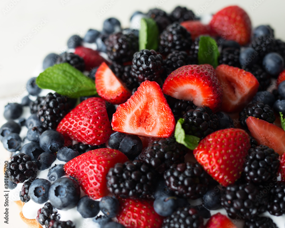 Close up of a strawberry, blackberry and blueberry pie. Close up of a strawberry, blackberry and blueberry pie.