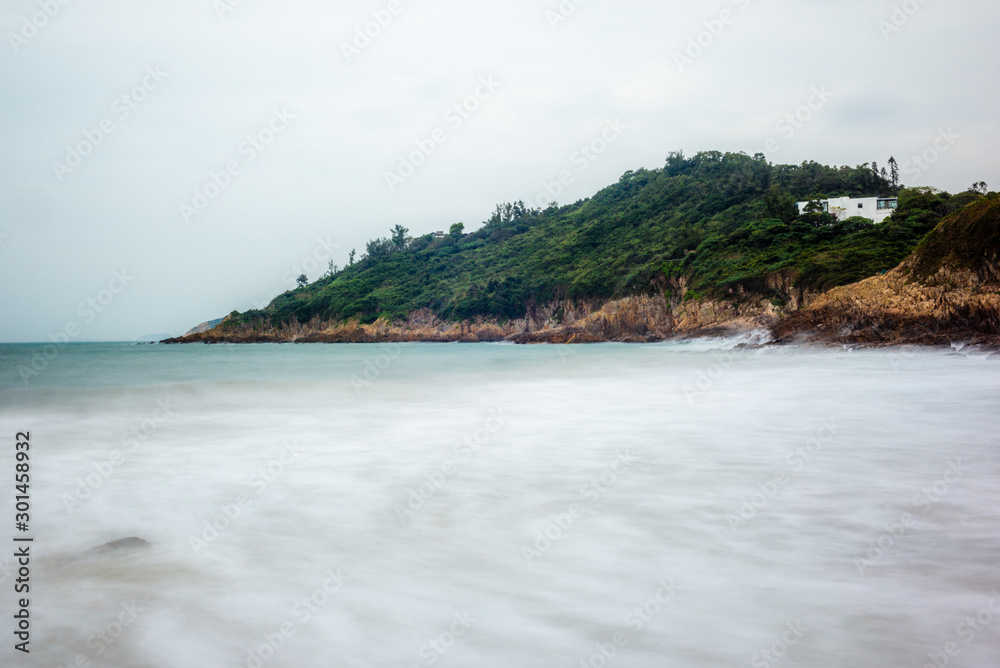 The seascape of the rocks and beach at Big Wave Beach in Hong Kong at sunrise - 6 The seascape of the rocks and beach at Big Wave Beach in Hong Kong at sunrise - 6