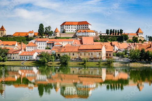 Ptuj town in Slovenia - beautiful view over the old town and castle in the sunny day photo