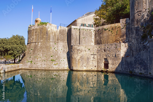 Montenegro . Old Town of Kotor, UNESCO-World Heritage Site. View of southern walls of ancient fortress and Gurdiс Bastion photo