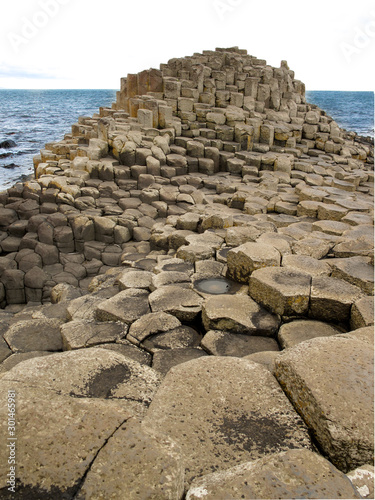 Famous Giant's Causeway in Northern IreFamous Giant's Causeway in Northern Ireland formed by hexagonal basalt columns that fell into the sealand formed by hexagonal