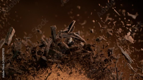 Super slow motion of flying group of raw chocolate shavings. Filmed on high speed cinema camera, 1000fps.