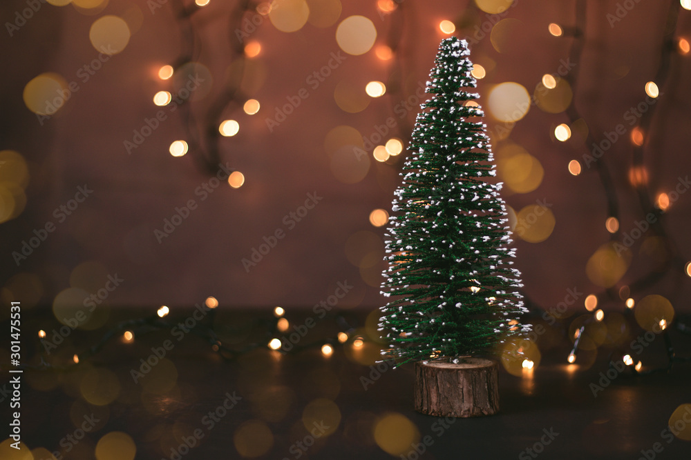 Christmas tree surrounded by bokeh lights Christmas tree surrounded by bokeh lights