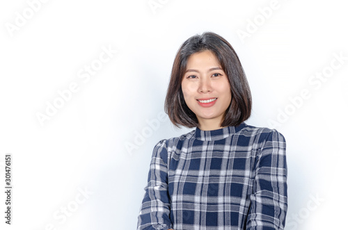 Portrait of a confident young woman standing isolated on white background.