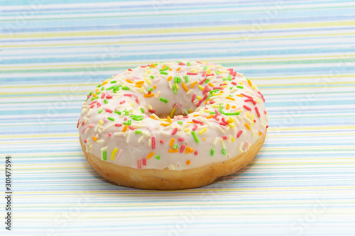 donut on blue with lines background, close up view