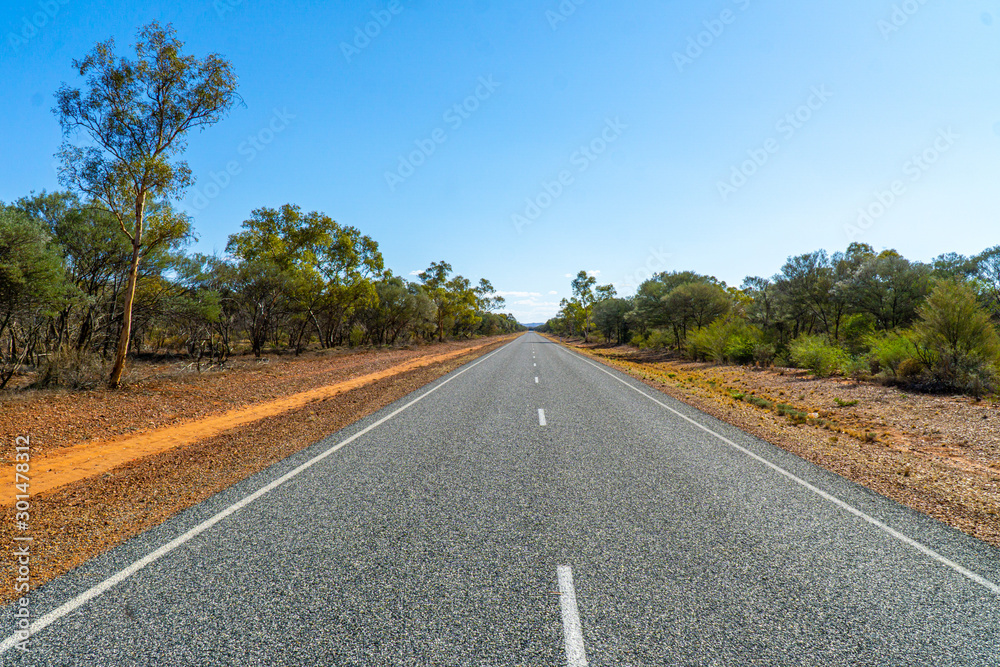 an australian highway leads through the middle of the outback an australian highway leads through the middle of the outback