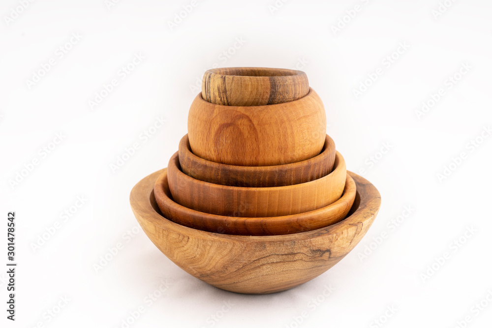 Set of wooden bowls on a white isolate. Set of wooden bowls on a white isolate.
