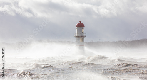 Lachine lighthouse being battered by a storm in early November, Quebec, Canada.