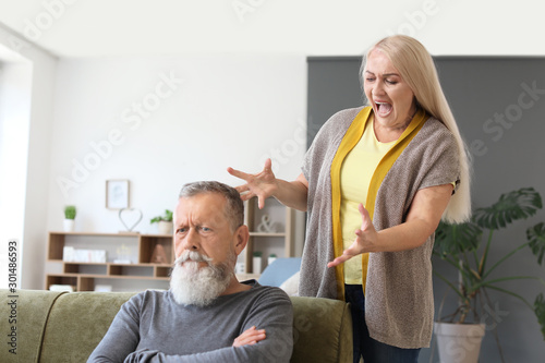 Angry mature couple having ...