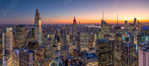 Fotografia New York City manhattan buildings skyline sunset evening