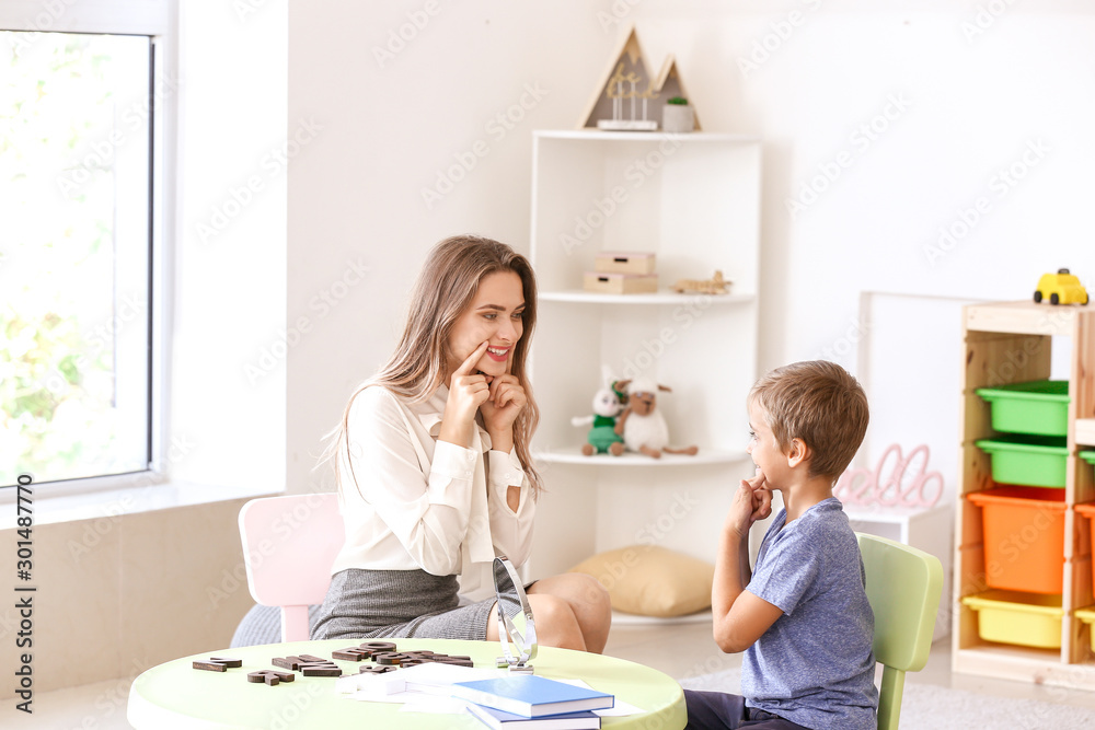 Cute little boy at speech therapist office Cute little boy at speech therapist office