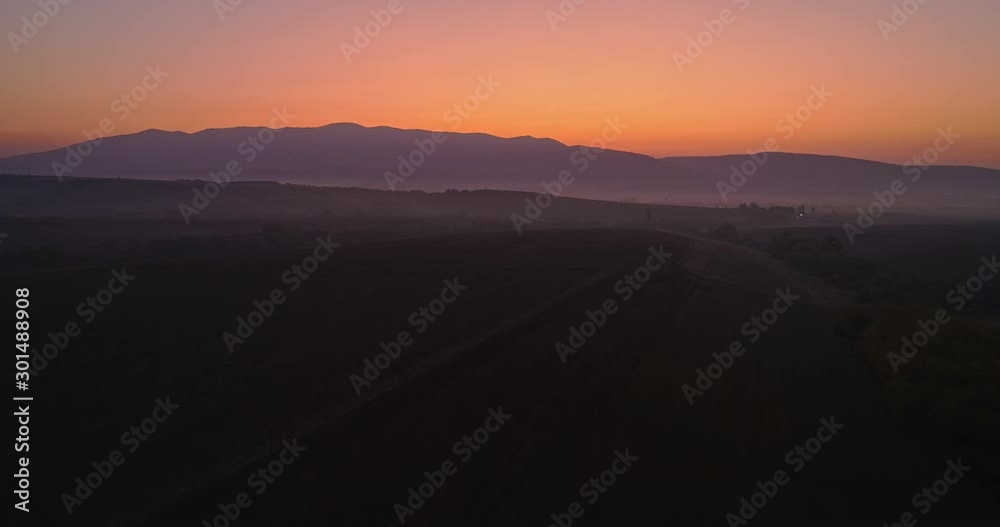 Aerial drone fly over northern Hungarian landscape at sunrise. Northern Matra mountains and hills. Aerial drone fly over northern Hungarian landscape at sunrise. Northern Matra mountains and hills.