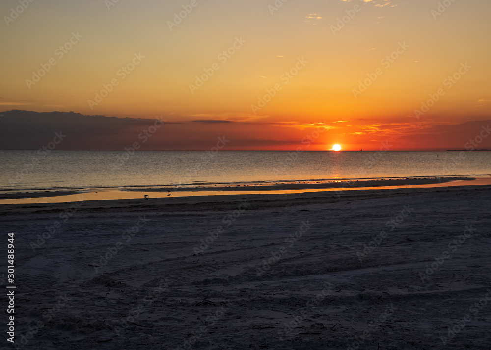 Deeply color sunset over the Gulf of Mexico on Fort Myers Beach