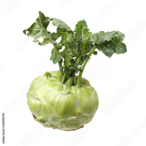 Fresh kohlrabi with green leaves on isolated white backround