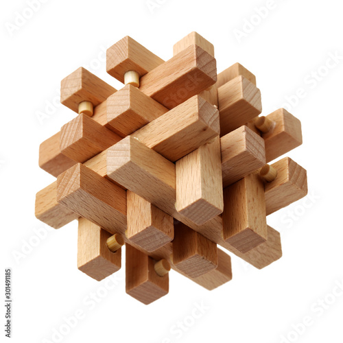 Wooden puzzle over white background