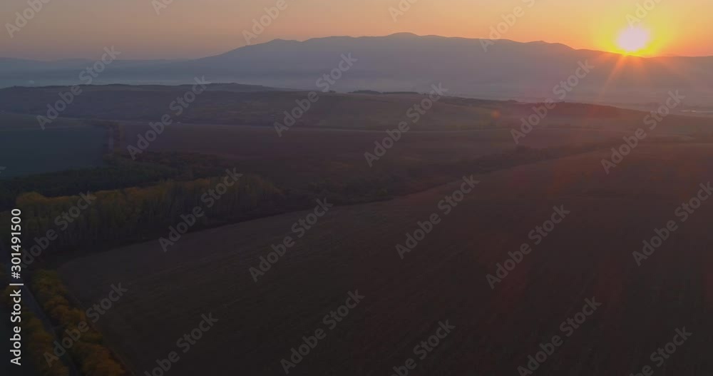 Aerial drone fly over northern Hungarian landscape at sunrise. Northern Matra mountains and hills. Aerial drone fly over northern Hungarian landscape at sunrise. Northern Matra mountains and hills.