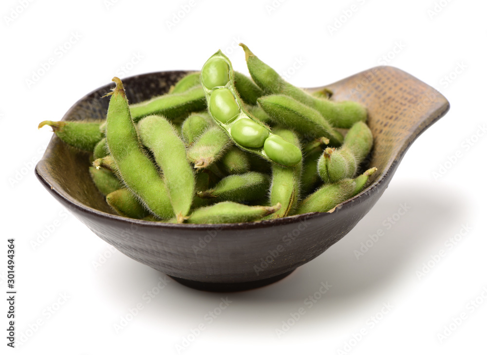 Fresh harvested soybean (edamame) plant isolated on white background Fresh harvested soybean (edamame) plant isolated on white background