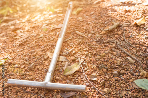 A soil sampling tube at biodiversity research plot in the evergreen forest.