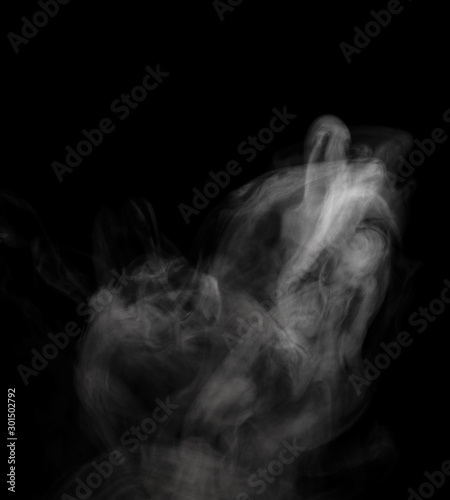 Fototapeta Naklejka Na Ścianę i Meble -  Abstract powder or smoke isolated on black background