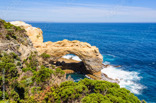 This naturally sculptured arch stands at 8 meters high - Port Campbell, Victoria, Australia photo