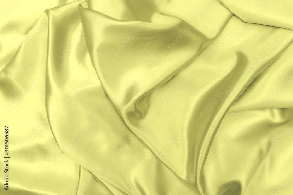 Fototapeta premium Yellow satin fabric texture soft blur background