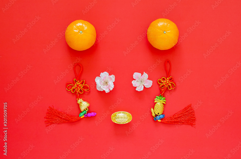 Chinese new year 2020 festival decoration set as rat face on red background. Flat lay for lunar year concept. (Chinese character on the decoration means “Fortune”.