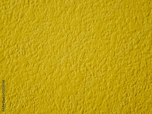 Yellow wall or paper texture,abstract cement surface background,concrete pattern,painted cement,ideas graphic design for web design or banner