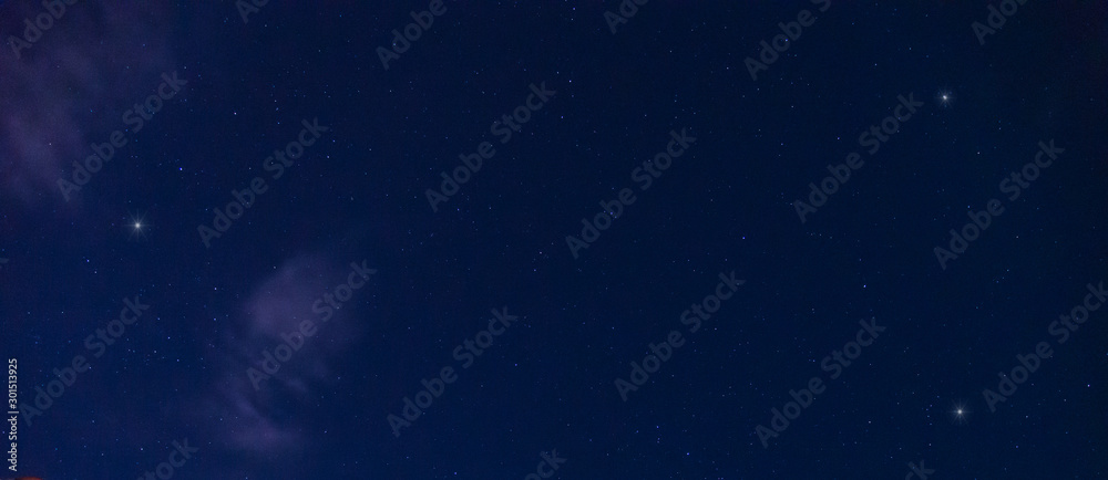 Panorama blue night sky milky way and star on dark background.Universe filled with stars  nebula and galaxy with noise and grain.Photo by long exposure and select white balance.Dark night sky.