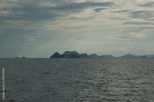 Silhouettes of distant mountains on the way from Koh Tao to Chumphon, Thailand