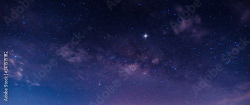 Panorama blue night sky milky way and star on dark background.Universe galaxy with noise and grain.Photo by long exposure and select white balance.selection focus.amazing