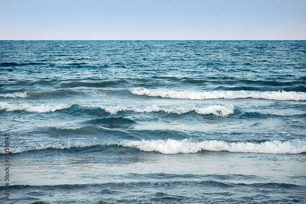Fototapeta premium Blue sea water surface on sky