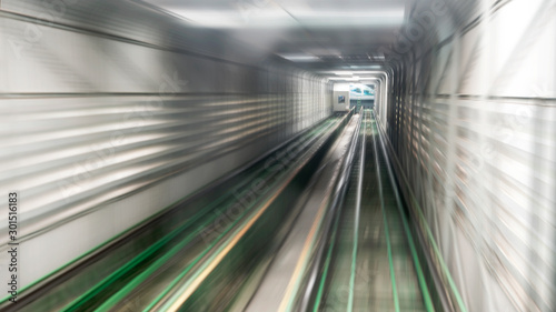 Motion blur of train moving inside tunnel. Move to goal or target concept.