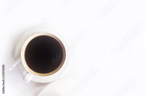 hot Espresso coffee in mug on White table background. top view.