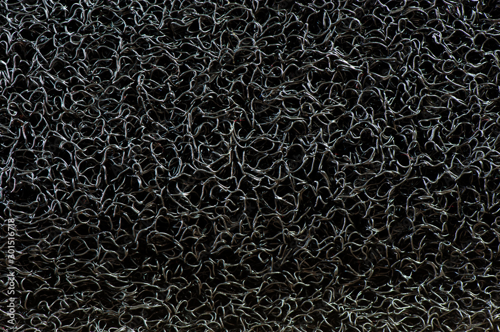 Close up of Vinyl dust trap carpet texture background. Abstract background  concept for pattern and design. Industrial black vinyl carpet Coil Pattern  Car Floor Mat texture. anti slippery surface Stock-bilde | Adobe