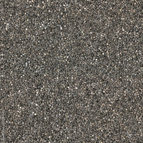 Porous material seamless texture. Black polyurethane foam background. Closeup photo