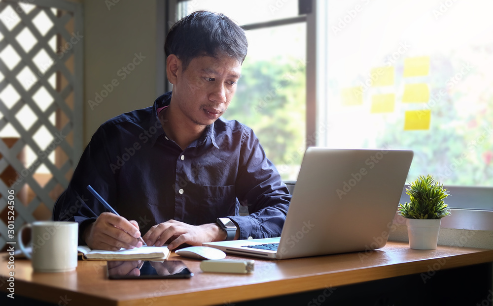 Business working in office with documents and laptop people Consulting and business planning. Business working in office with documents and laptop people Consulting and business planning.