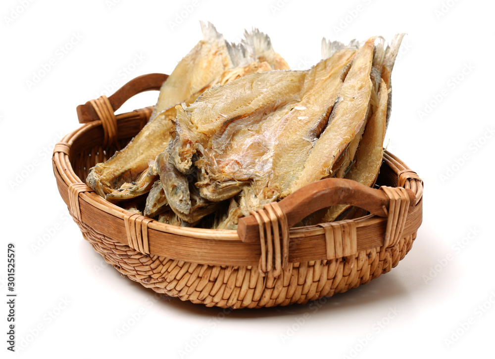 Dried salted fishes on white background