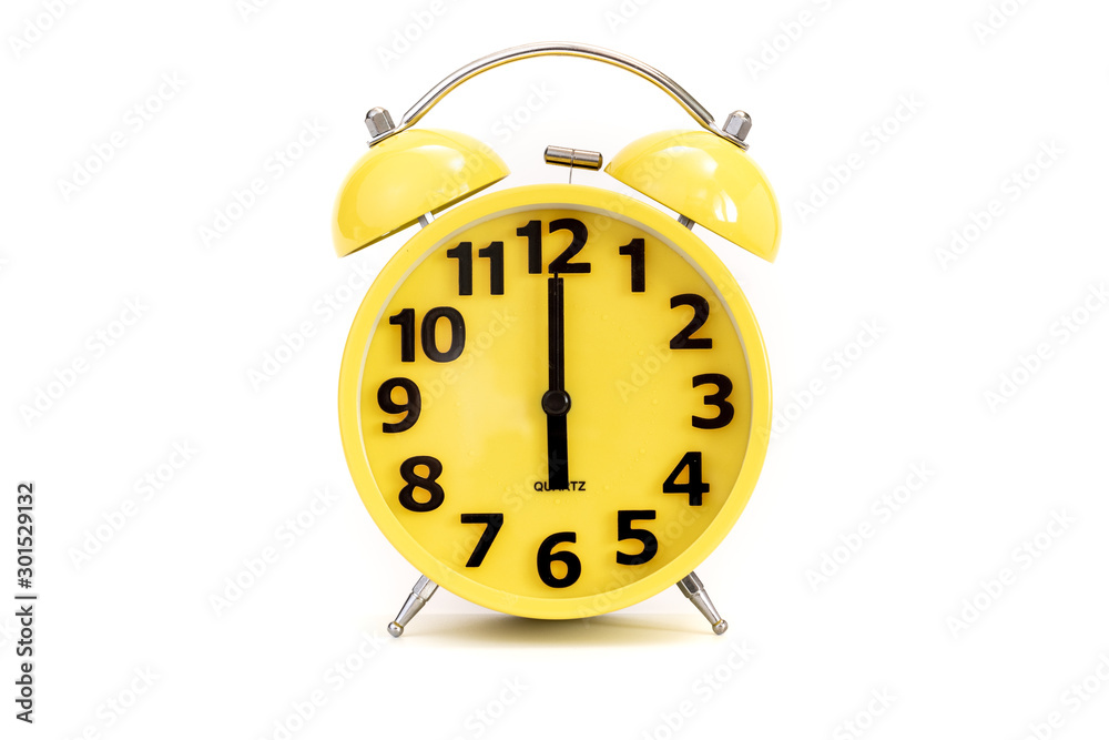 Yellow alarm clock on white at 6 o'clock