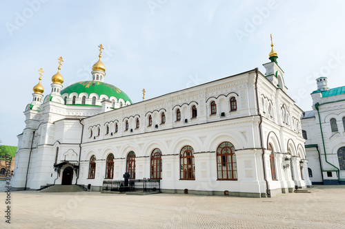 Russian Orthodox Refectory church of famous medieval Pechersk Lavra with Pyotr Stolypin (Prime Minister of Russian Empire) grave by the entrance, Kiev, Ukraine