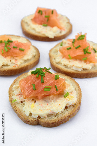 toast with smoked salmon on a white background