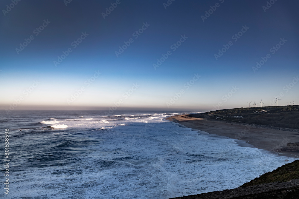 Atlantic ocean in morning light next to Nazare, Portugal.