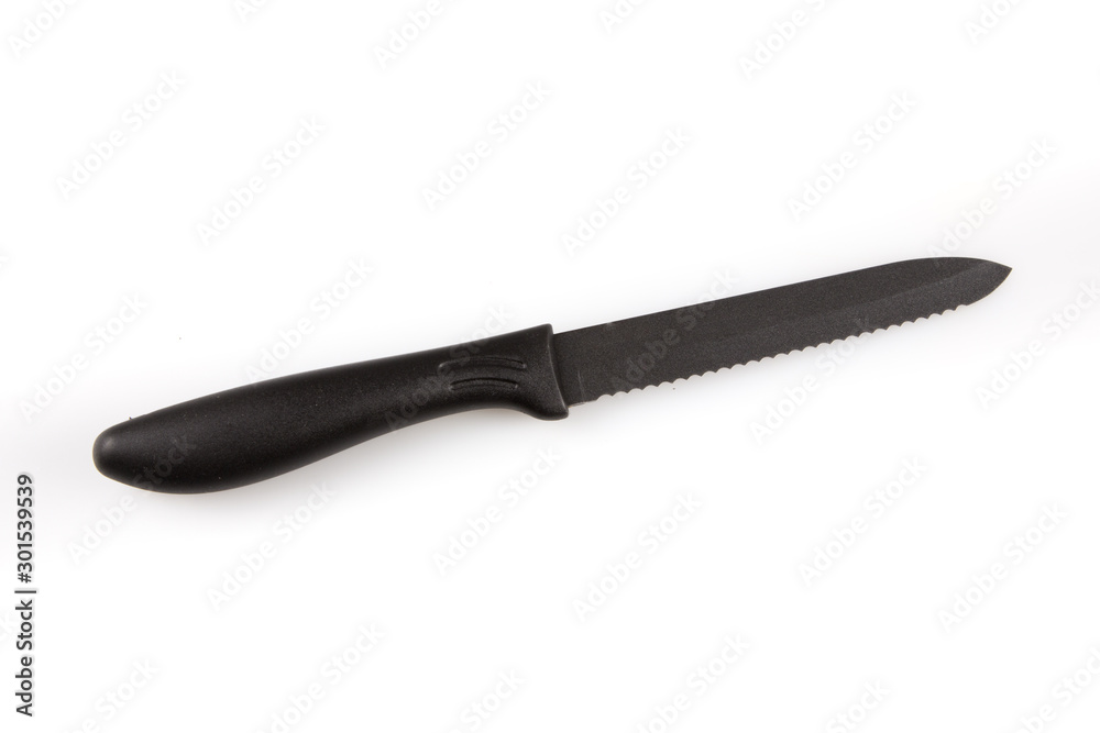 Bread knife real black isolated against white background Bread knife real black isolated against white background