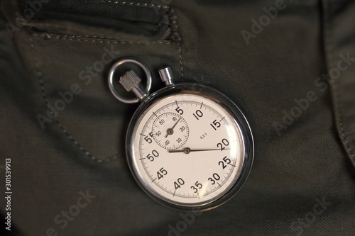 old pocket watch on dark background
